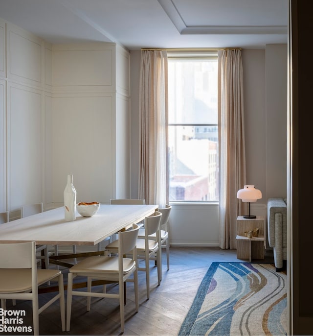 dining space featuring light wood-type flooring