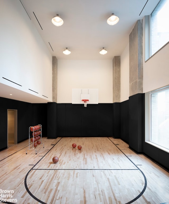 view of basketball court with a healthy amount of sunlight