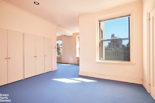 unfurnished bedroom with a closet