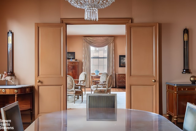 dining space featuring an inviting chandelier