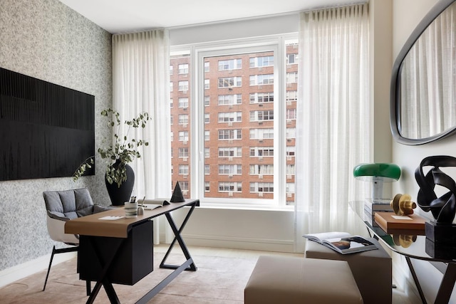 office area featuring baseboards and wallpapered walls