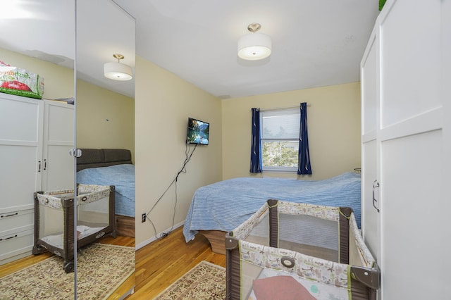 9729 4th Ave Unit 3-C, New York City, NY 11209 - bedroom with wood finished floors and baseboards