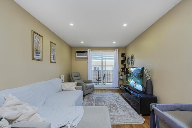 9729 4th Ave Unit 3-C, New York City, NY 11209 - living area with wood finished floors, recessed lighting, and a wall unit AC