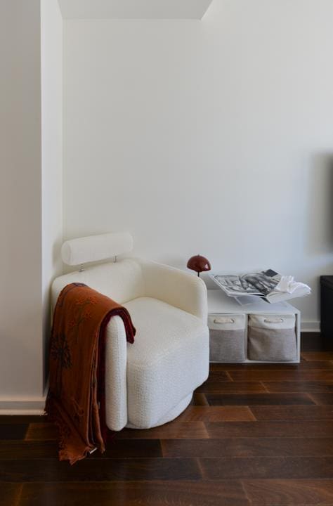 sitting room featuring wood finished floors and baseboards