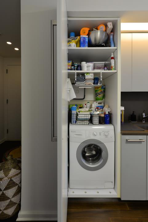 laundry room featuring washer / clothes dryer, wood finished floors, and recessed lighting