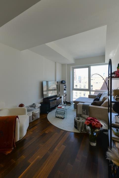 living room with wood finished floors