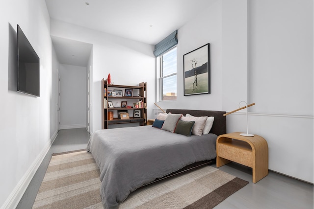 bedroom featuring light wood-type flooring