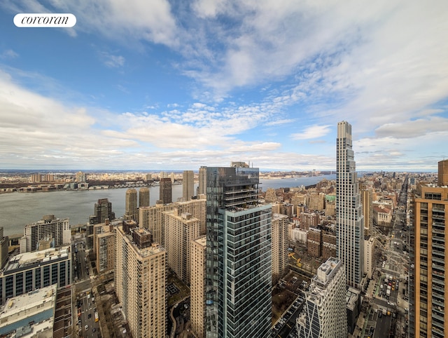 property's view of city featuring a water view
