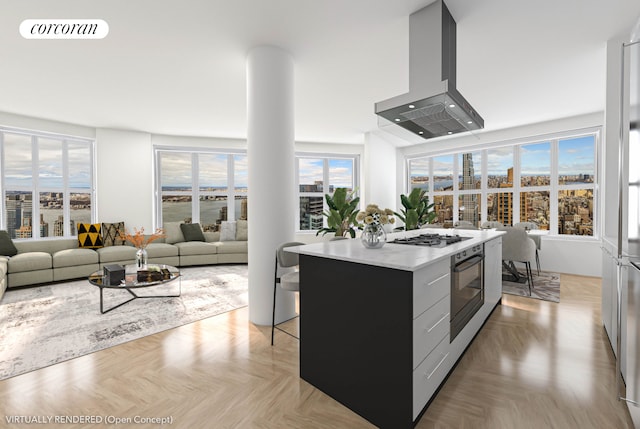 kitchen featuring visible vents, a center island, light countertops, island exhaust hood, and stainless steel appliances