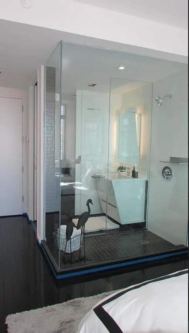 bathroom with wood finished floors
