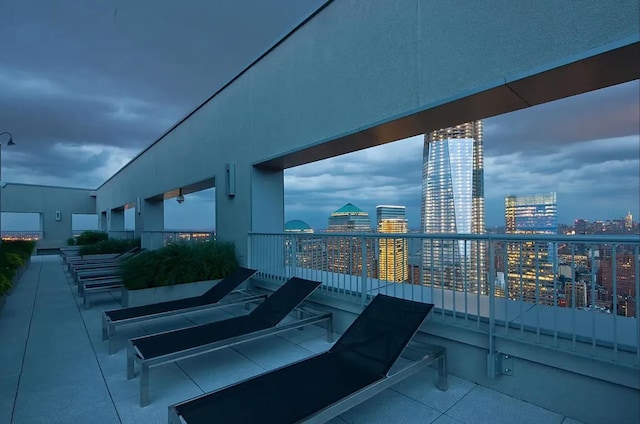 exterior space with a view of city and a balcony