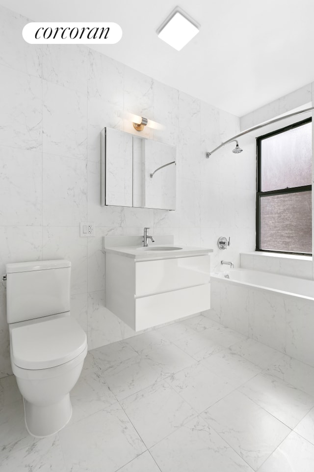 305 W 150th St Unit 501, New York City, NY 10039 - bathroom with vanity, marble finish floors, toilet, and a combined bath / shower with marble appearance