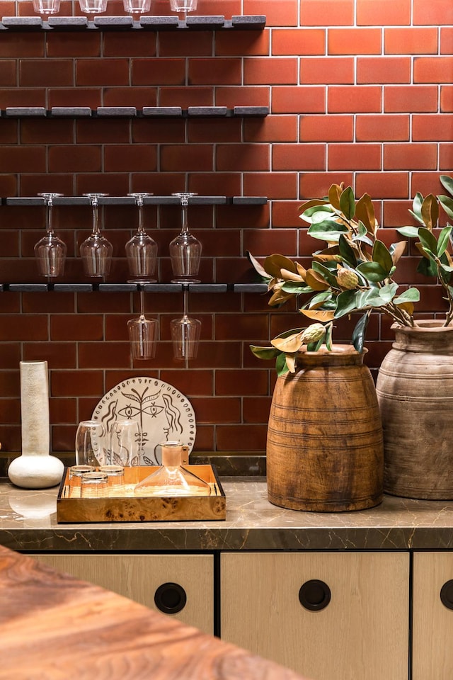 interior details featuring decorative backsplash