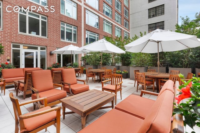 view of patio featuring an outdoor living space and outdoor dining area