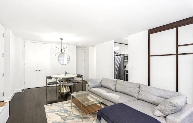 living room featuring dark wood-type flooring