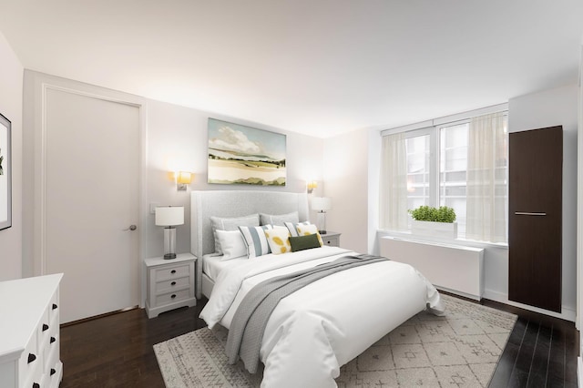 bedroom featuring dark wood-style floors