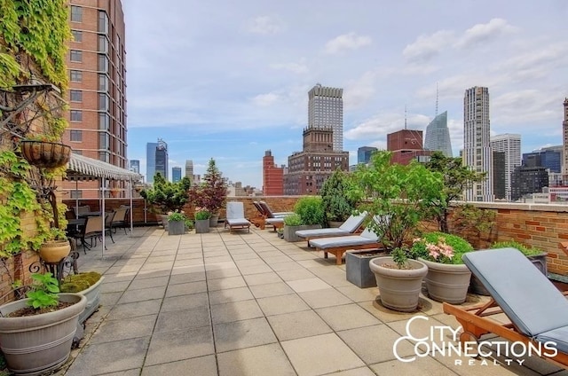 view of patio / terrace with a view of city