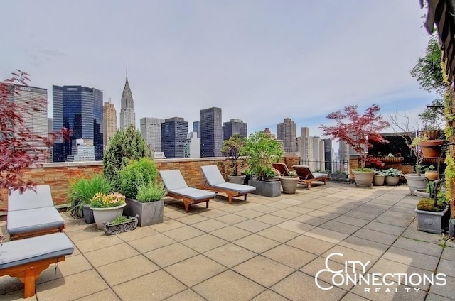 view of patio featuring a view of city