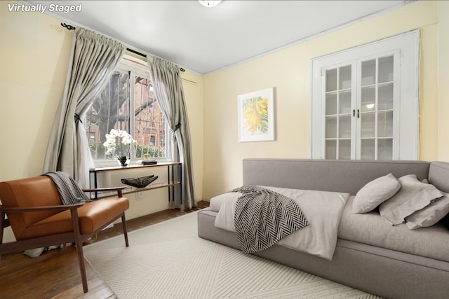 bedroom featuring wood finished floors