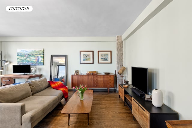 living room with dark wood finished floors and visible vents