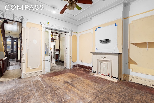 1044 Lafayette Ave, New York City, NY 11221 - unfurnished living room featuring a ceiling fan and crown molding