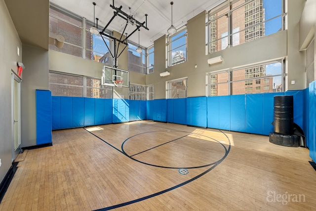 view of sport court featuring community basketball court and fence