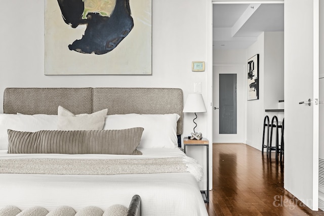 bedroom featuring wood finished floors