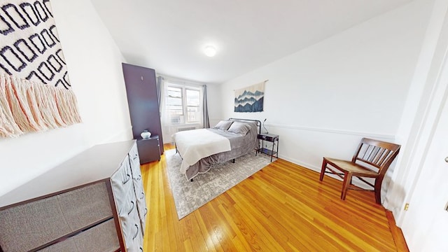 bedroom featuring light wood-type flooring