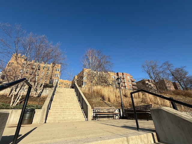 view of home's community featuring stairs