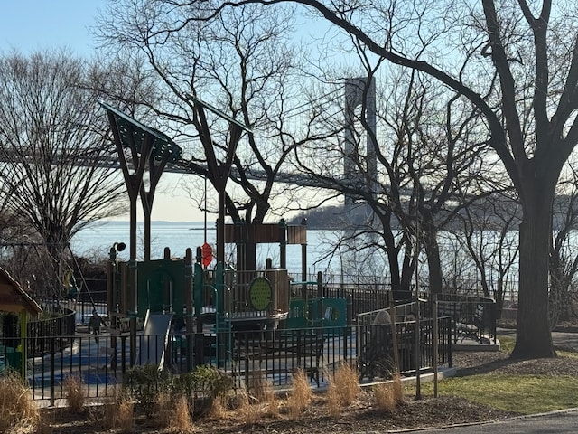 communal playground featuring fence