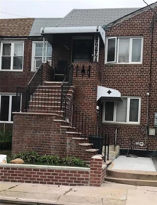 1207 E 83rd St, New York City, NY 11236 - view of front of house featuring brick siding
