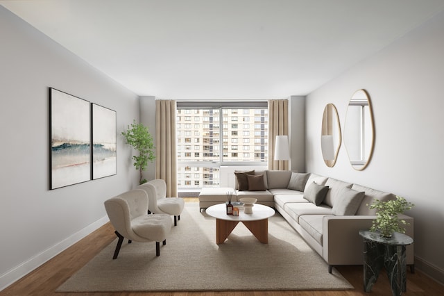 living room with baseboards and wood finished floors