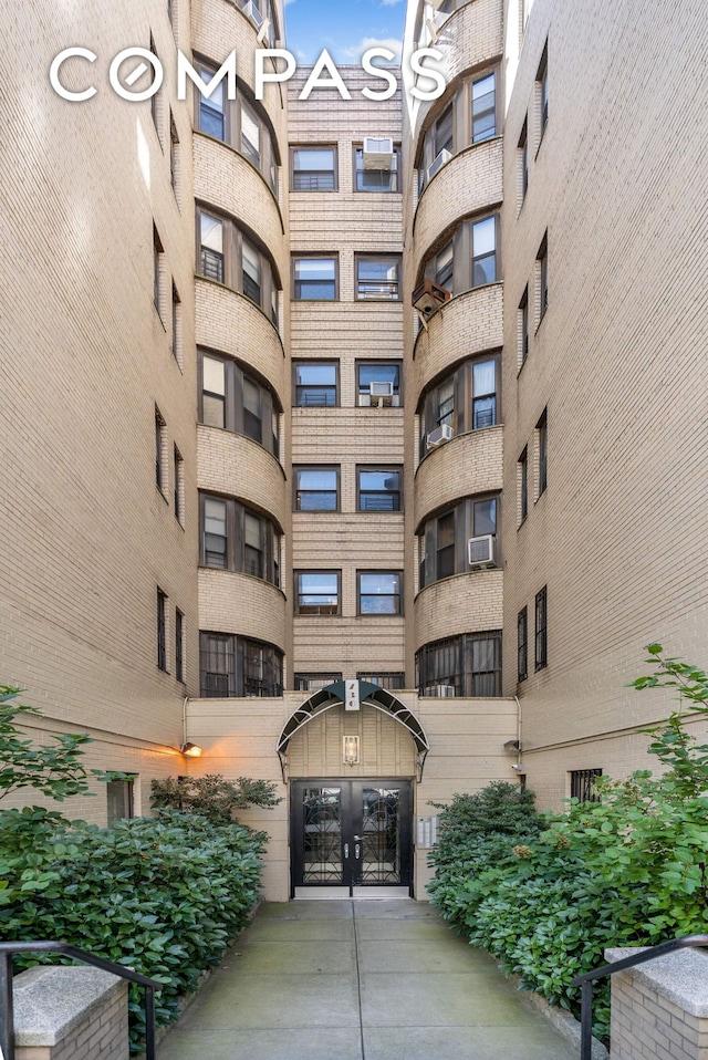 view of building exterior featuring cooling unit