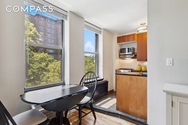 689 Fort Washington Ave Unit 4B, New York City, NY 10040 - dining area with light wood finished floors