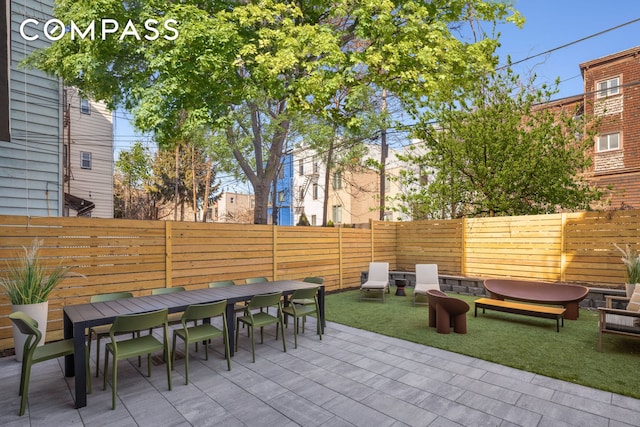 view of patio / terrace with a fenced backyard and outdoor dining space