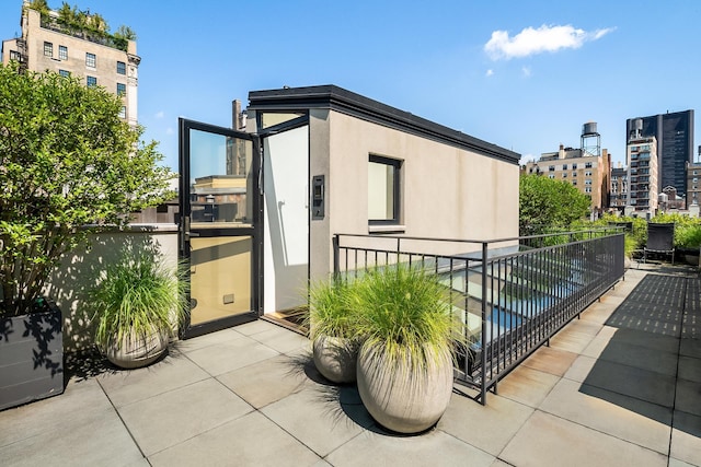 view of patio / terrace featuring a view of city