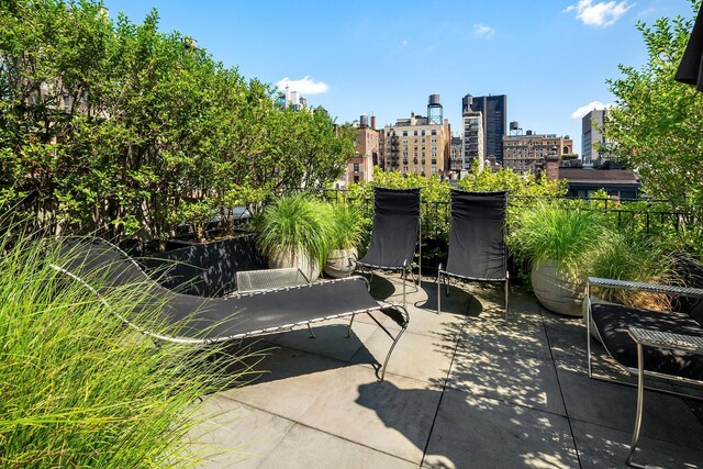 view of patio / terrace featuring a view of city