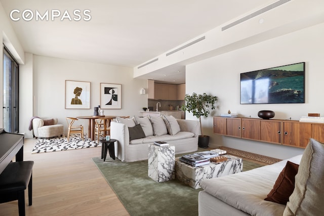 living area with light wood-type flooring