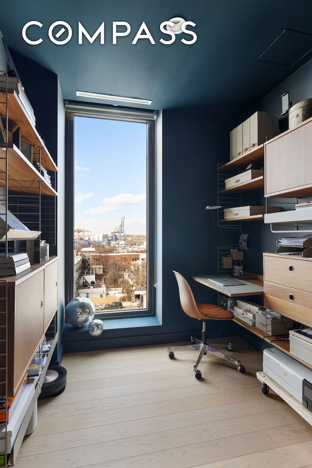 office featuring a view of city and wood finished floors