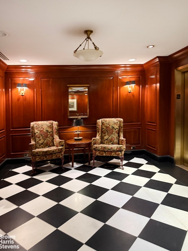 176 E 77th St Unit 7D, New York City, NY 10075 - living area with elevator, recessed lighting, crown molding, and wooden walls