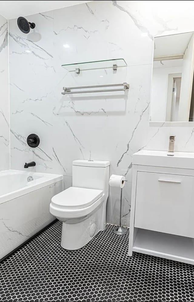 282 E 38th St, New York City, NY 11203 - bathroom with vanity, toilet,  shower combination, and tile patterned flooring