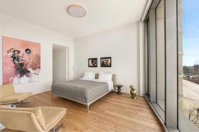 bedroom featuring light wood-type flooring