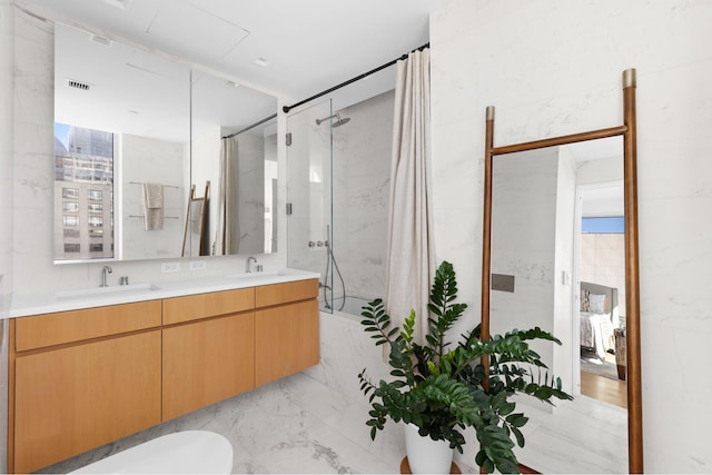 bathroom with a sink, double vanity, and a shower with shower curtain