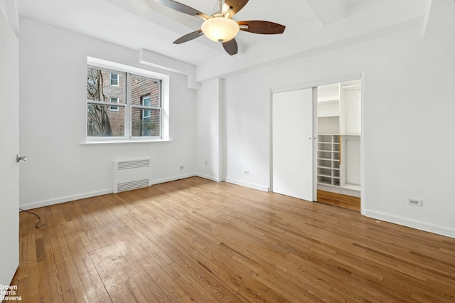 3750 Hudson Manor Ter Unit Ee, New York City, NY 10463 - unfurnished bedroom with radiator, hardwood / wood-style flooring, and a ceiling fan