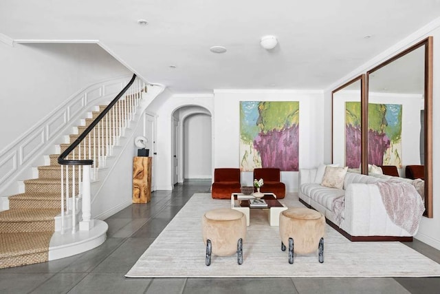 123 E 69th St, New York City, NY 10021 - living room featuring stairs and arched walkways