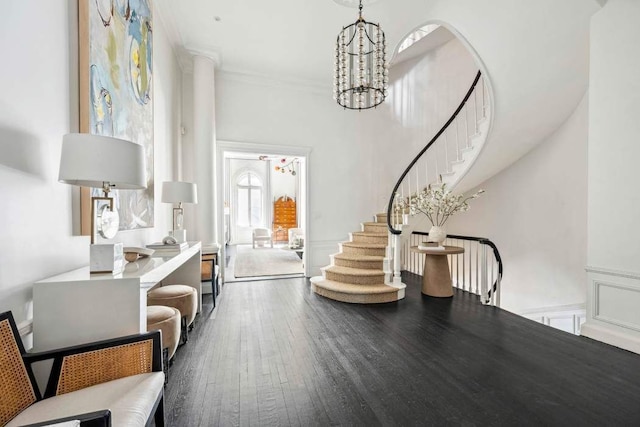 123 E 69th St, New York City, NY 10021 - entryway with stairway, wood finished floors, and a chandelier