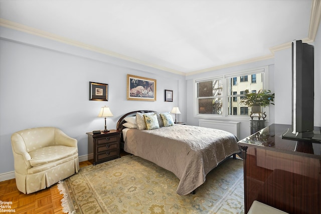 bedroom featuring baseboards and ornamental molding