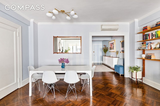 dining area featuring baseboards, crown molding, and a wall mounted AC