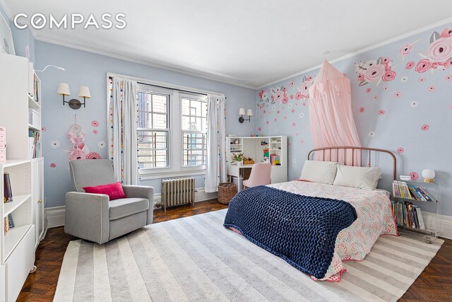 bedroom with baseboards, ornamental molding, and radiator heating unit