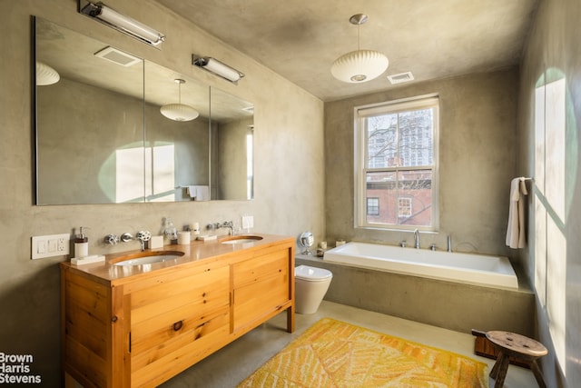 full bathroom with finished concrete floors, visible vents, and a sink